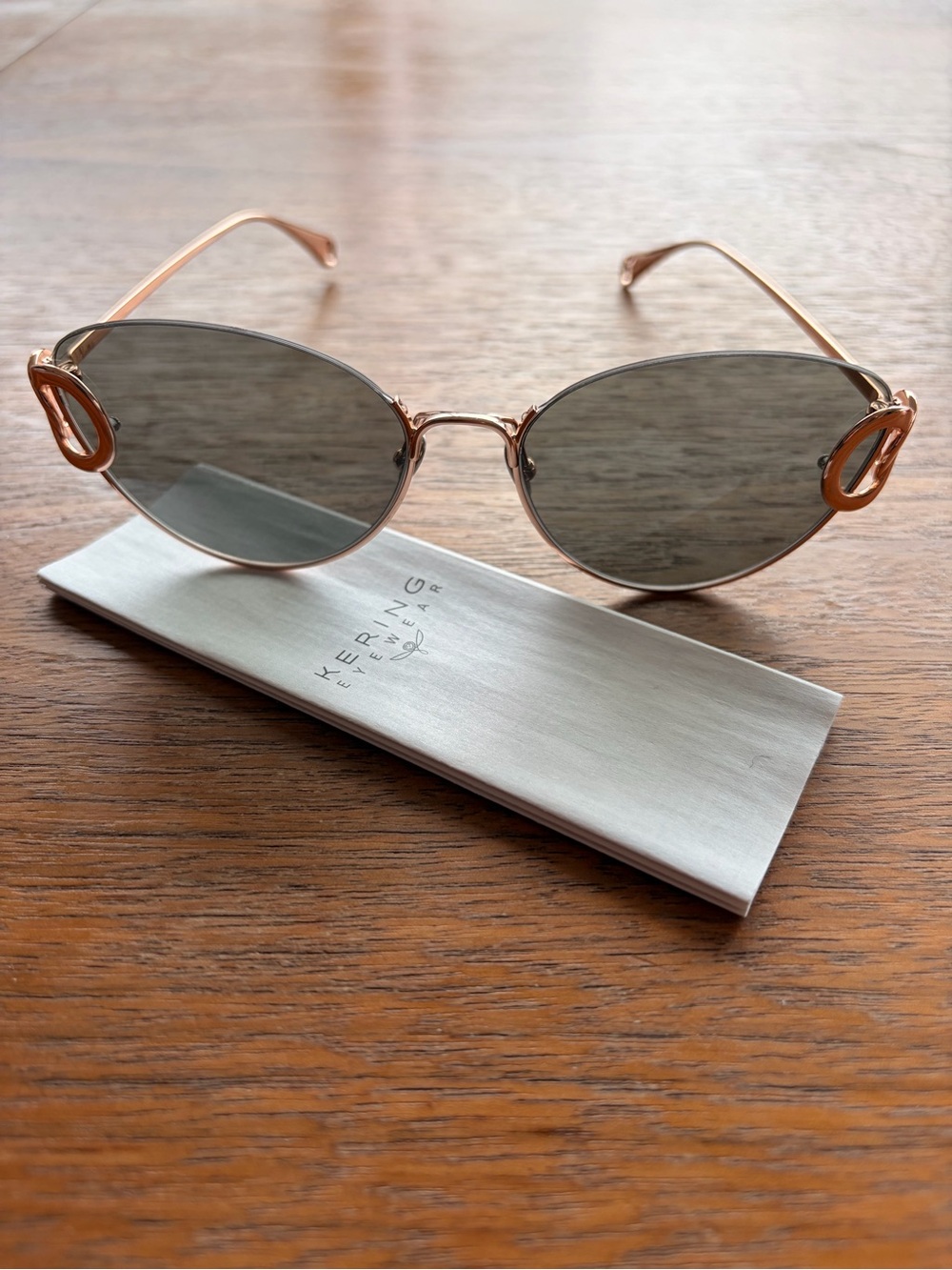 Pomellato Rose Gold Frame Sunglasses with Gray Lenses